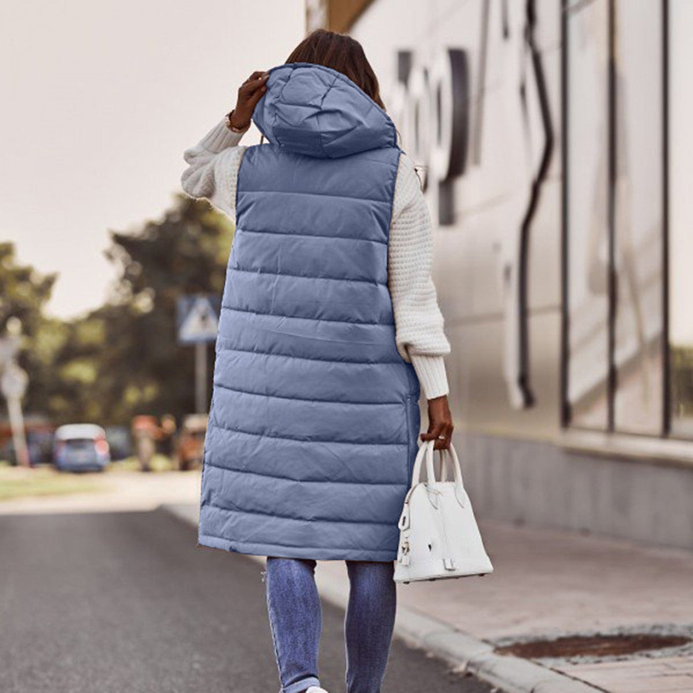 Dames Lange Bodywarmer Met Capuchon En Knopen